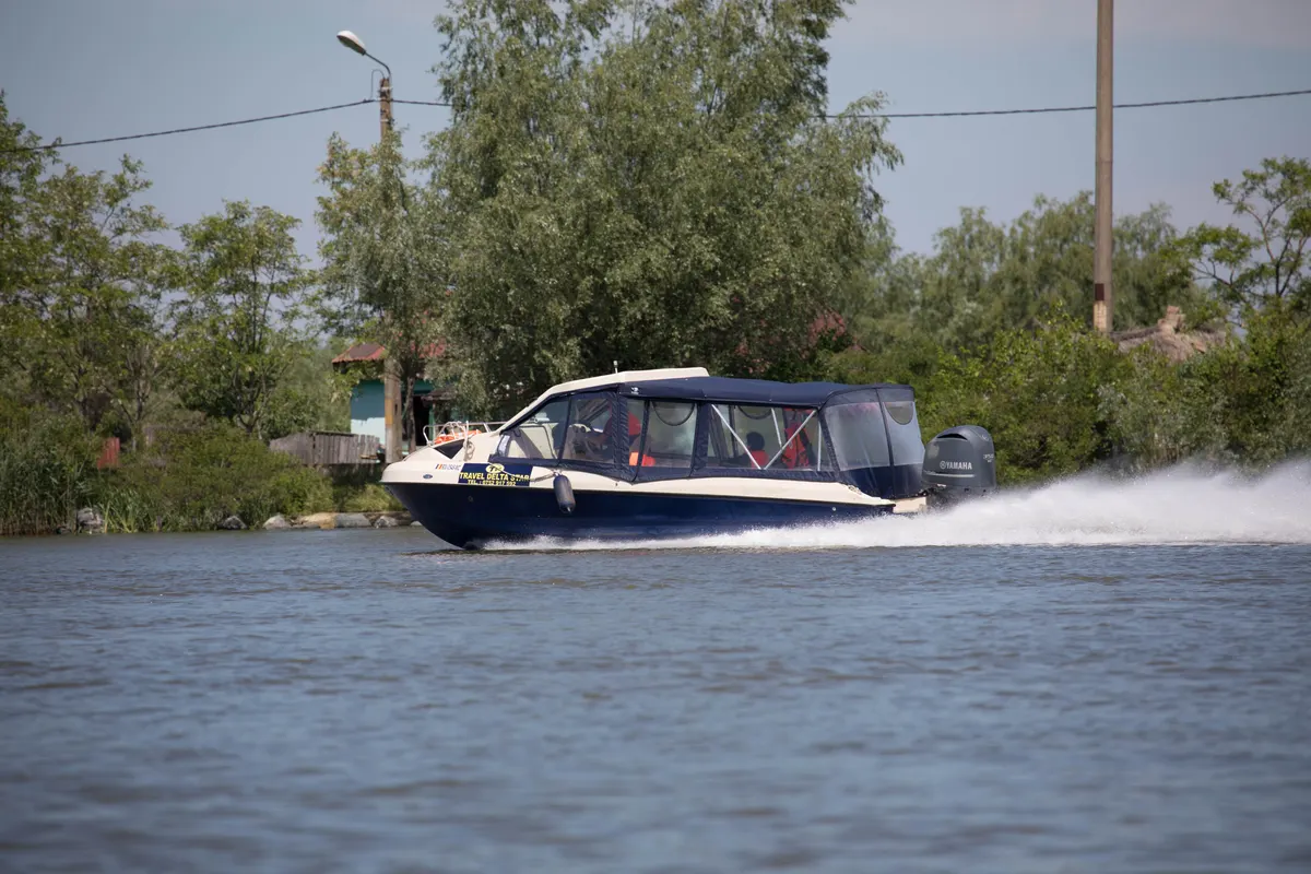 Travel Delta Star boat leaving a wake on the Danube