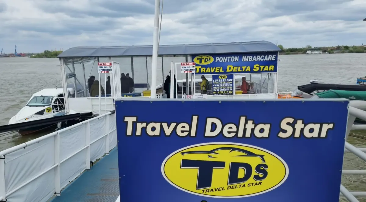 The Travel Delta Star sign on the boarding pontoon